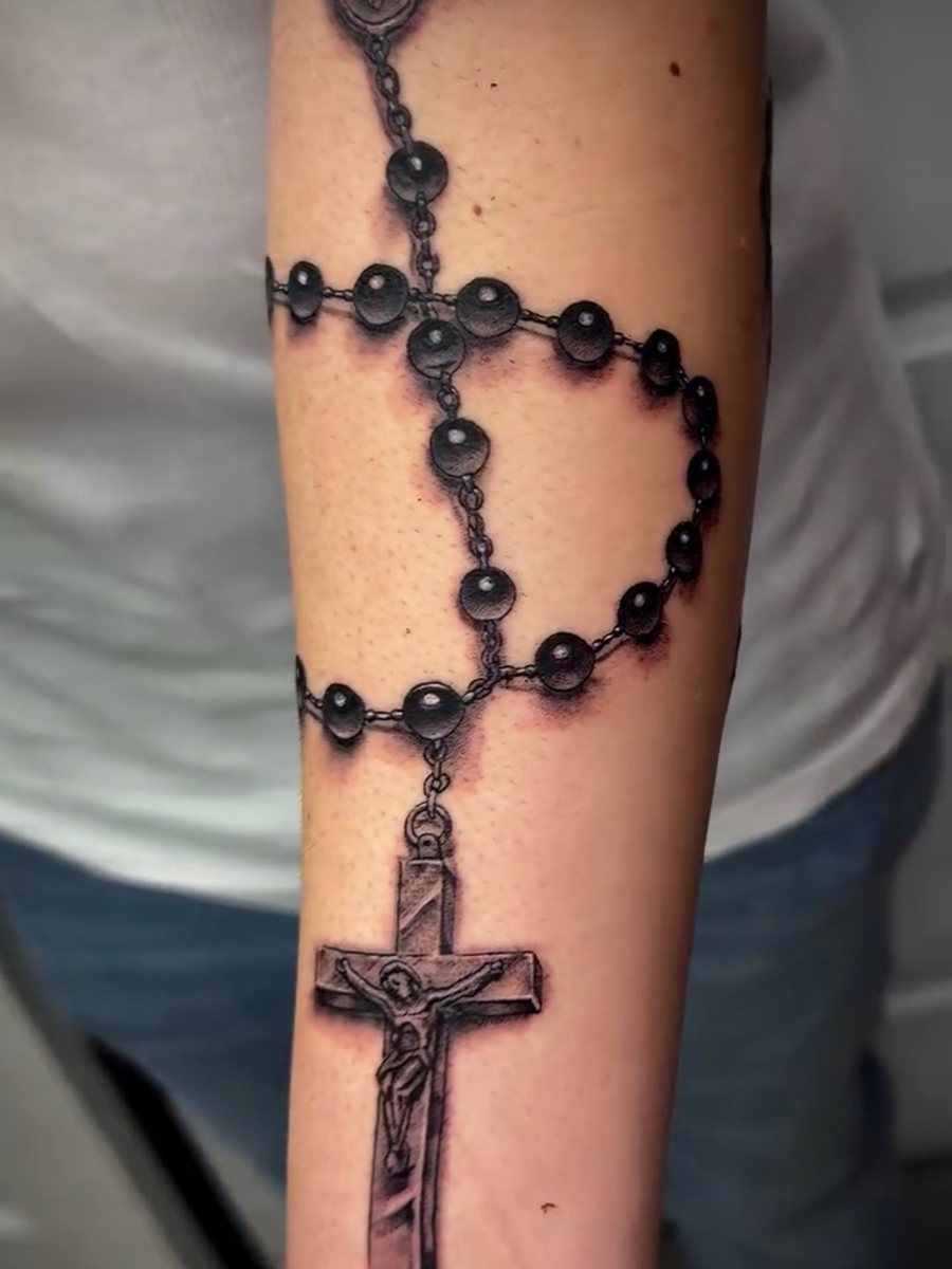 Rosary with a crucifix wrapped around the forearm, black and grey realism tattoo by Brendon at Diamond Mind Tattoo, Buzzards Bay