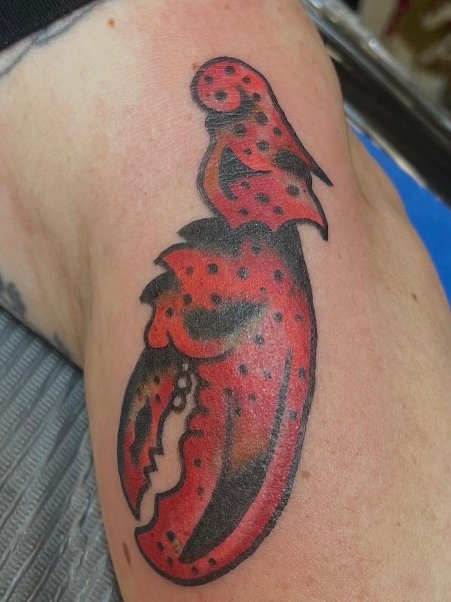 Red lobster claw on the arm, American Traditional tattoo by Chris at Diamond Mind Tattoo, Buzzards Bay