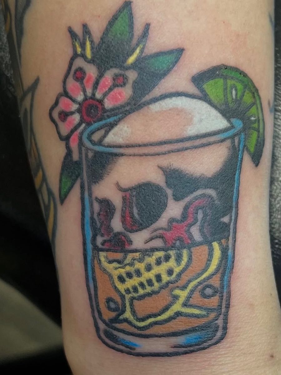 Skull in a cocktail glass with a lime wedge and a flower, American Traditional tattoo by Chris at Diamond Mind Tattoo, Buzzards Bay