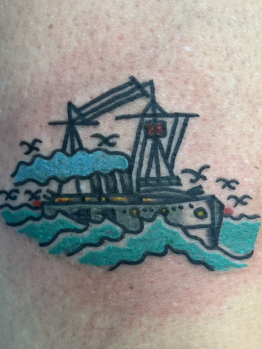 Steamship on teal waves with seagulls, American Traditional tattoo by Chris at Diamond Mind Tattoo, Buzzards Bay